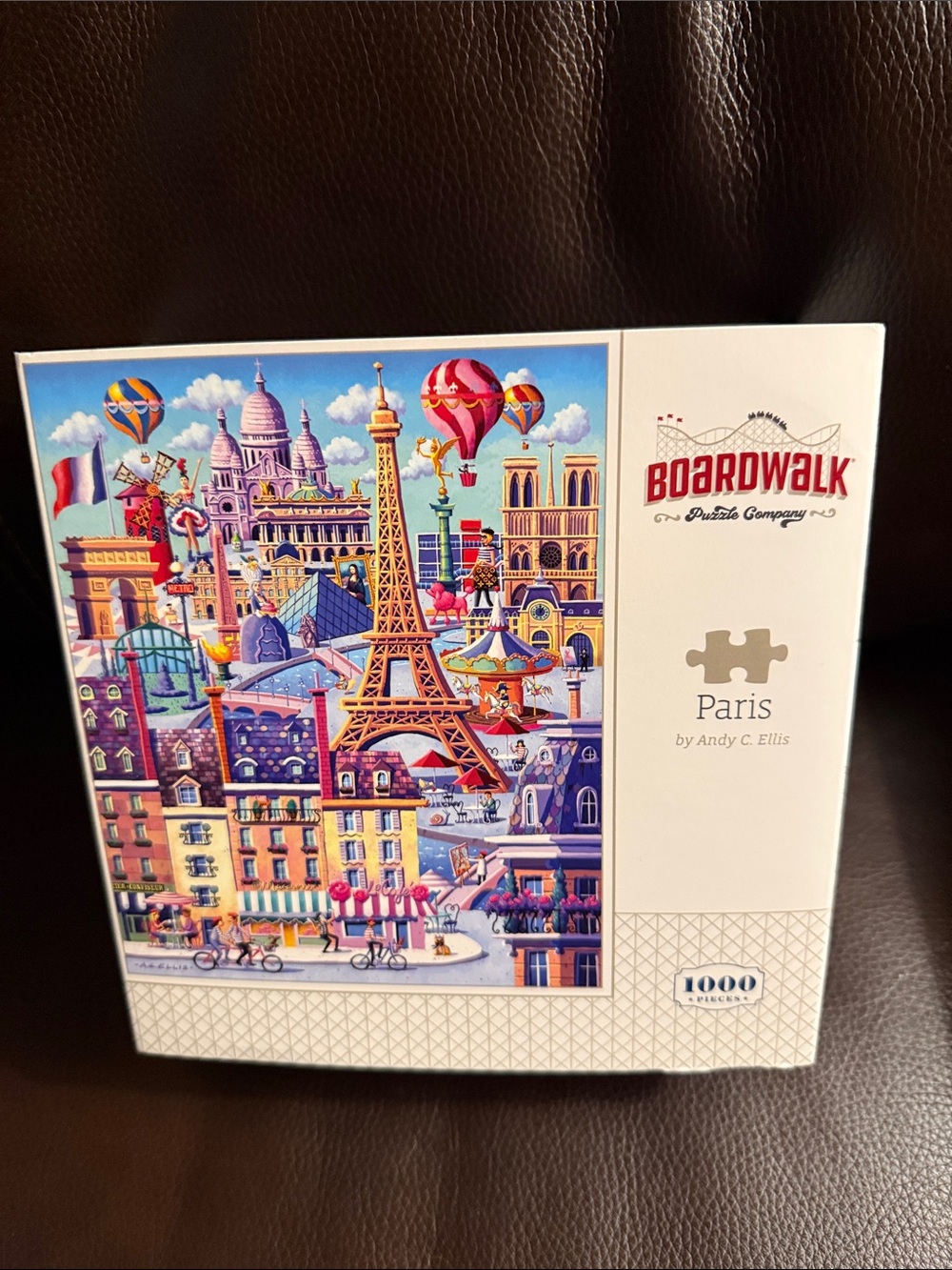 Paris 1000-Piece Jigsaw Puzzle by the Boardwalk Puzzle Company, with poster